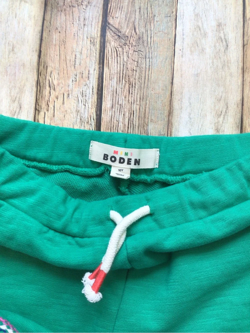Mini Boden Green Pom Pom Shorts